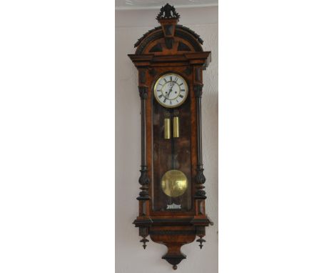 A Quality burr walnut, 19th century two weight regulator clock with an arched top and white enamel dial 