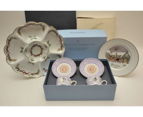 A Royal Worcester 'Holly Ribbon' dish plus 1979 Christmas plate and a Wedgwood Millennium Collection teacup set, all boxed