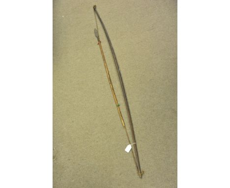 A tribal bow and arrow.