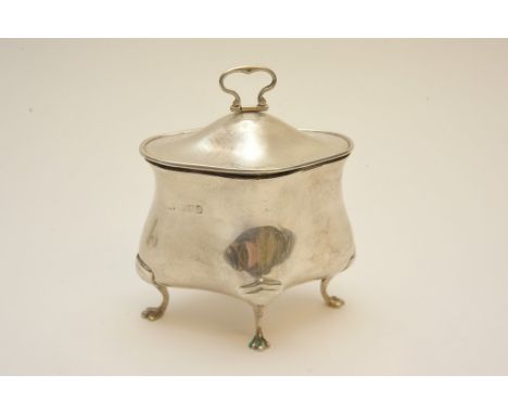 A silver footed caddy type pot of unusual shape, bearing Chester hallmarks