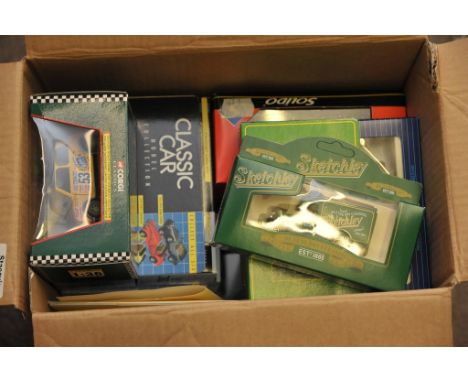 A box of toy cars including Corgi classics 
