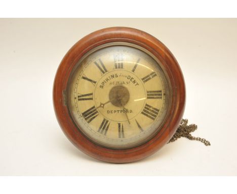 An antique mahogany postman's alarm clock, the white painted dial marked Spikins from Dent 84 High St Deptford