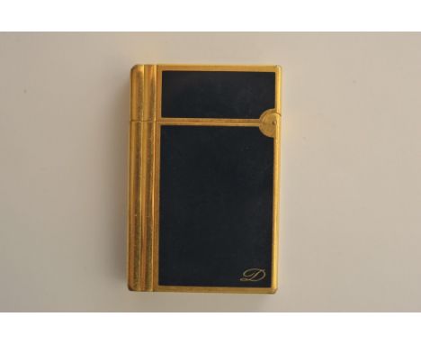 A gold plated and dark blue enamel Dupont lighter