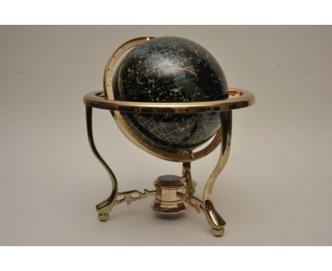 A globe fitted in a gilt stand