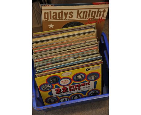 A collection of LP records including Elvis Presley and The Who