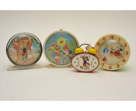 Four novelty alarm clocks a smiths noddy clock, post War Disney Mickey mouse and woody (4) 