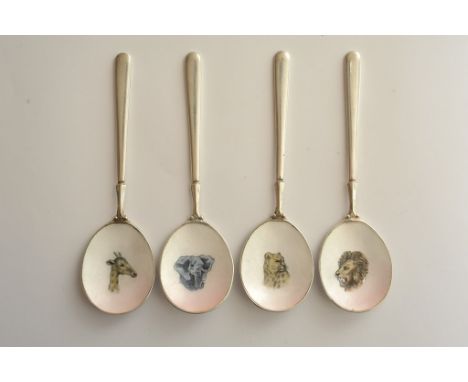 A set of four silver teaspoons having enamel bowls decorated with African Game portraits of Lions, Leopard, Elephant and Gira
