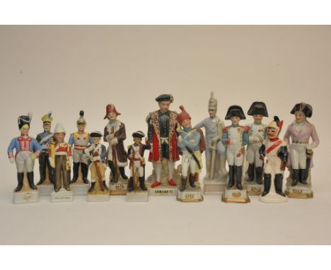 A collection of ceramic French soldiers including bisque and a model of Edward VI