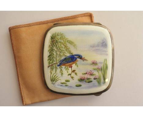 A silver and enamel ladies powder compact, the lid decorated with a scene of a Kingfisher