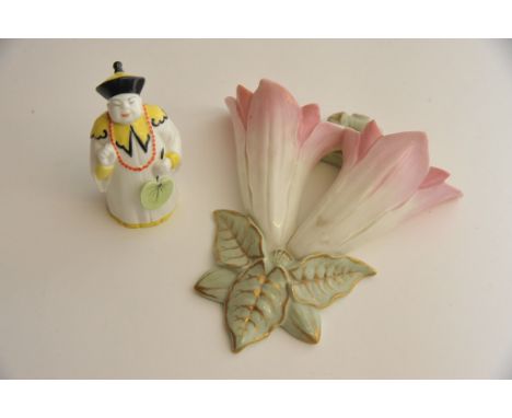 A Royal Worcester candle snuffer and a wall pocket 