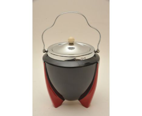 An Art Deco Wilkinson 'Yoo Hoo' pattern biscuit barrel with black body on red tripod feet having chrome lid and handle, desig
