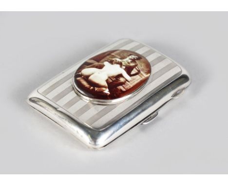 AN ENGINE TURNED CIGARETTE CASE. Birmingham 1918, with an oval The Artist.
