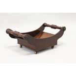 A GOOD GEORGE III MAHOGANY STILTON COASTER on brass castors. 1ft 5ins wide.