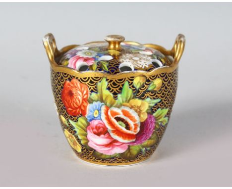 A 19TH CENTURY SPODE SMALL POT POURRI AND PIERCED COVER painted with gold scale on a floral decorated blue ground pattern 116