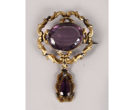 A VICTORIAN AMETHYST BROOCH.