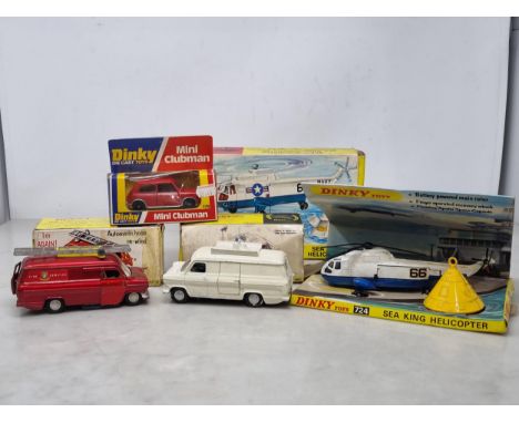 A boxed Dinky Toys No.724 Sea King Helicopter, a boxed No.287 Police Accident Unit, No.286 Ford Transit Fire Appliance and a 