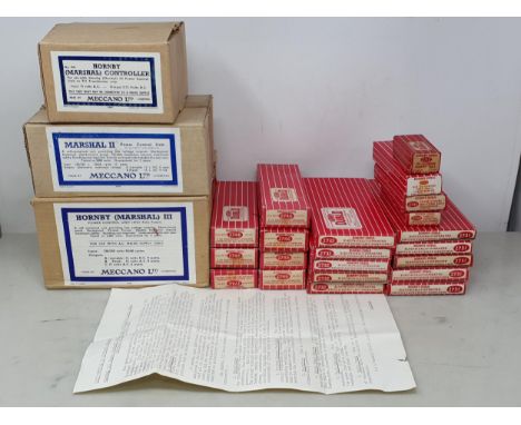 Twenty one boxes of Hornby Dublo 2-rail Track, all appear mint and unused, comprising 7x 2746 electric uncoupling Rails, 5x 2