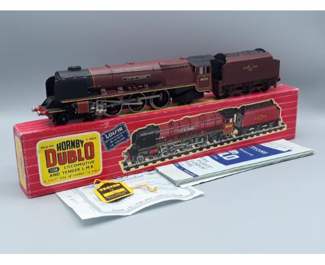 A boxed Hornby Dublo 2326 Export 'City of London' with correct tender, M, showing no signs of use to the wheels. Box is the s