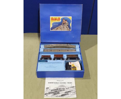 A boxed Hornby Dublo EDG7 2nd issue horseshoe LMS Set, has the later LMS tank without the gold leaf lettering. Set in mint co