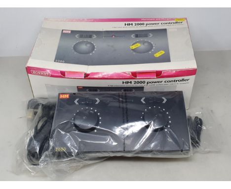 A boxed Hornby Hammant and Morgan HM2000 Controller, unused within sealed plastic bag