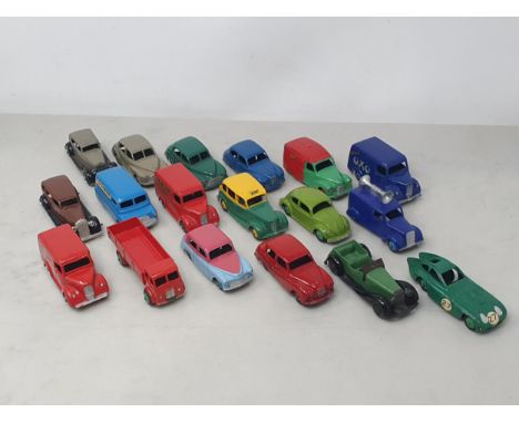 Eighteen unboxed Dinky Toys including Trojan 'Esso' Van, 'Oxo' Van, 'Dunlop' Van, blue and pink Hillman Minx, red Austin Some