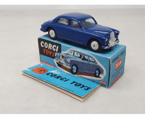A boxed Corgi Toys No.205M dark blue Riley Pathfinder, Nr M-M, with illustrated leaflet, box Ex plus