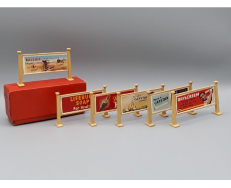 A boxed Hornby 42381 Box of six Station Hoardings in lighter red box, Ex plus- Nr M, box Nr M