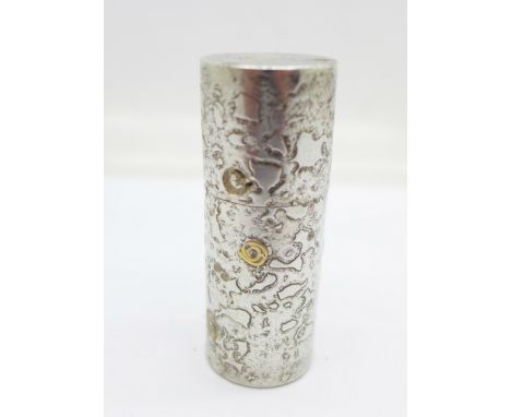 A hallmarked silver lipstick holder