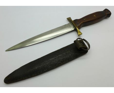 A German WWII fighting knife and scabbard