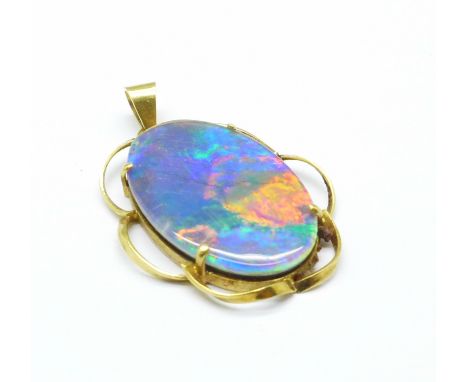 A large doublet opal pendant set in yellow metal marked 750, 8.2g, opal 32mm x 20mm