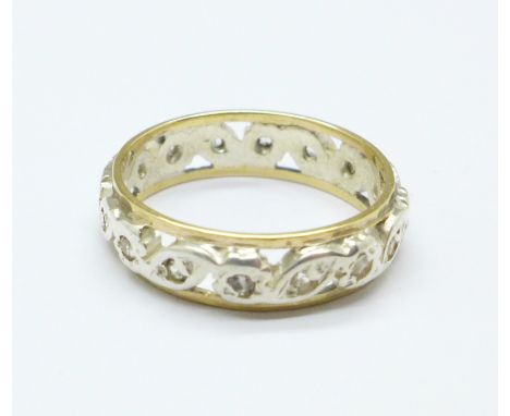 A 9ct gold, silver and white stone eternity ring, K