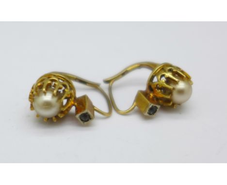 A pair of yellow metal and pearl earrings, 2.3g
