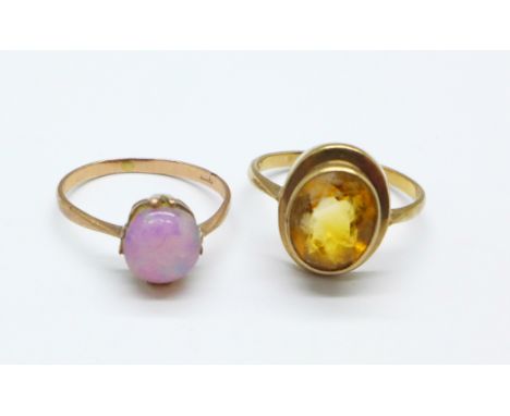 A 9ct gold and citrine ring and a 9ct gold and stone set ring, 4.2g, K and N