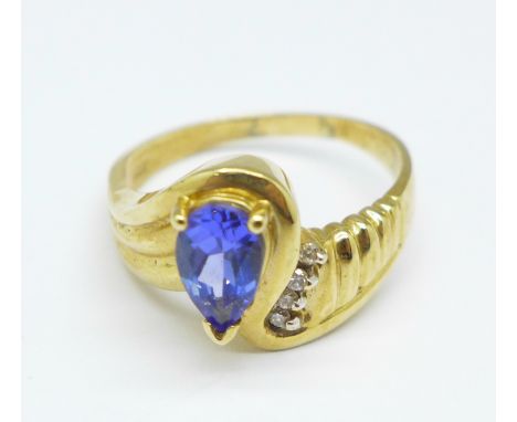 A 14ct gold, tanzanite and diamond ring, 5g, P