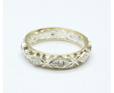 A 9ct gold, silver and white stone eternity ring, L