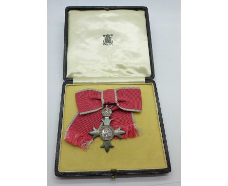 A silver MBE medal, boxed