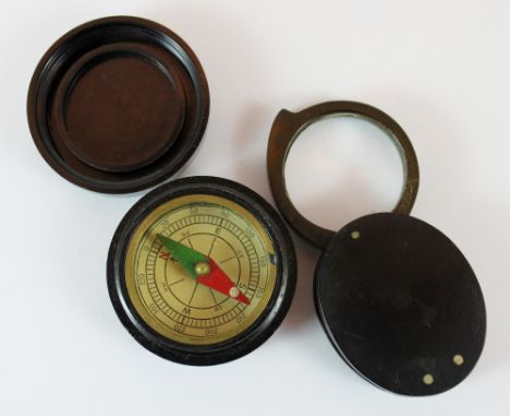 Bakelite handheld compass and similar loupe