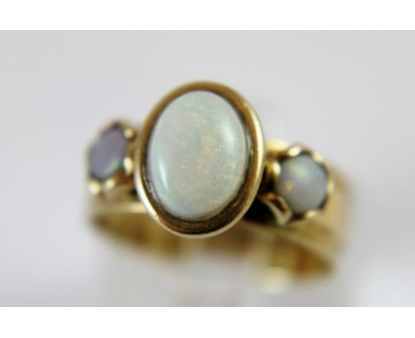 9 ct gold three opal stone set ring, 4.6g. size K 