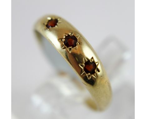 9 ct gold three stone garnet ring, Size N