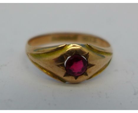 A 9ct gold and red stone ring, 1.5g, Chester 1915