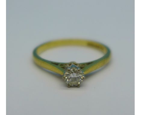 An 18ct gold solitaire diamond ring, 2g, L