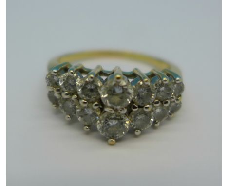 A 14ct gold and diamond ring, 4.8g, S, set with two rows of seven graduated diamonds