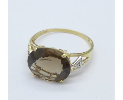 A 9ct gold, smoky quartz and diamond ring, 1.9g, N