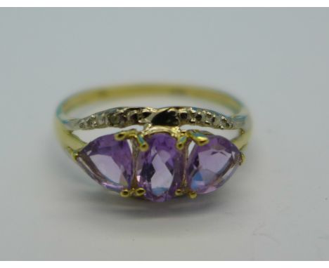 A 9ct gold, amethyst and diamond ring, 1.4g, O