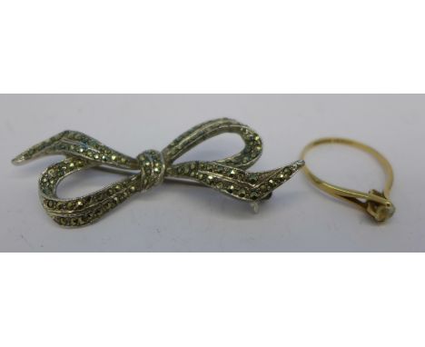 A 9ct gold ring and a marcasite brooch, (ring 1.5g, P)