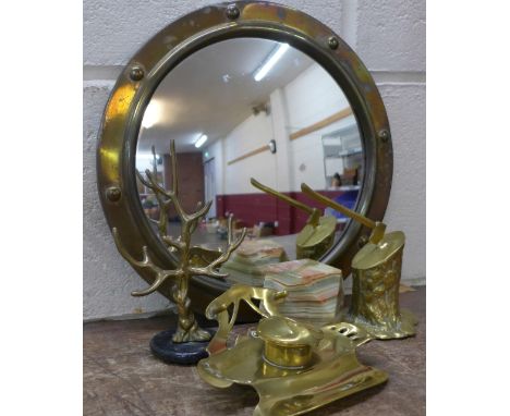 A mirror, inkstand, ring stand and two paperweights