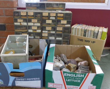 Three cabinets of geological specimens with books and tools, microscope