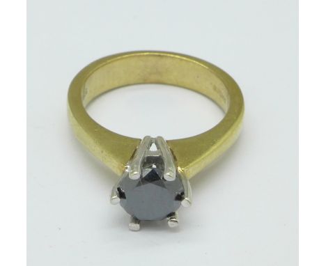 A 9ct gold and black diamond ring, approximately 1 carat diamond weight, 5.2g, N