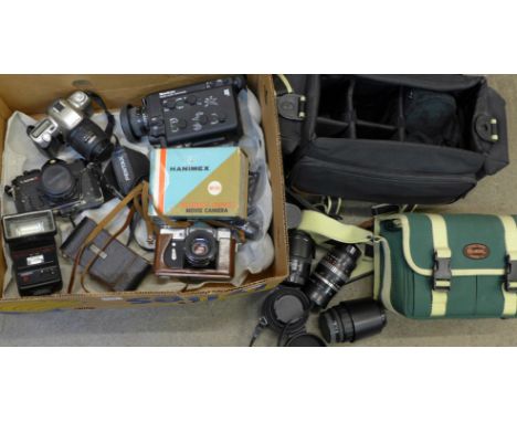 A collection of film cameras and two movie cameras, four lenses, etc., including Zenit, Yashica, Pentax and camera bags
