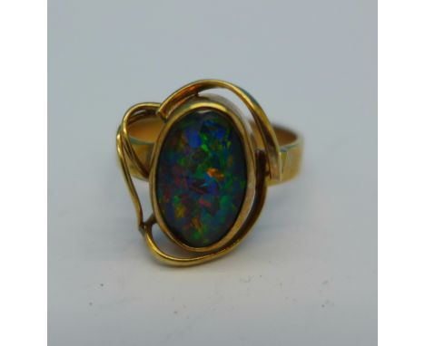 A 9ct gold and doublet opal ring, 2.8g, L